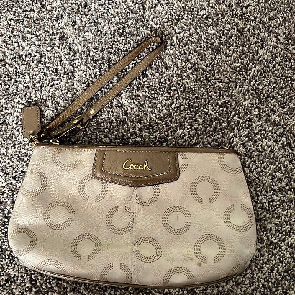 White and tan Coach Wristlet Wallet